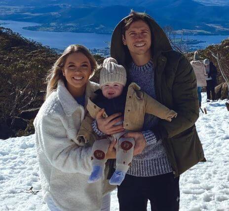 Katelyn Timmings with her fiance Craig Goodwin and child during their family holiday.